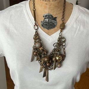 Subversive metal necklace.